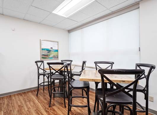 Designer Roller Shades Closed in Break Room