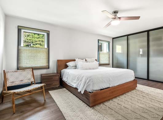Provenance® Woven Wood Shades in Bedroom Top-Down