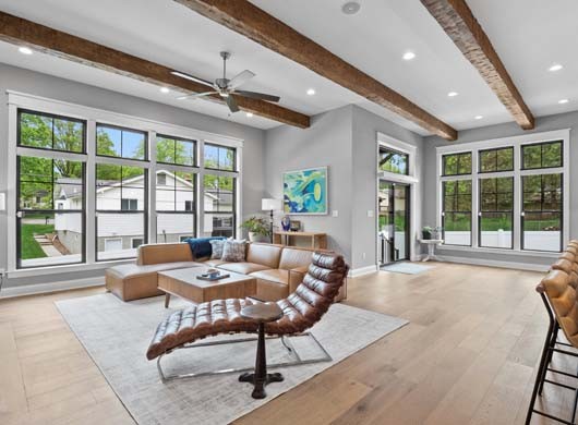 Designer Banded Shades Up in Living Room