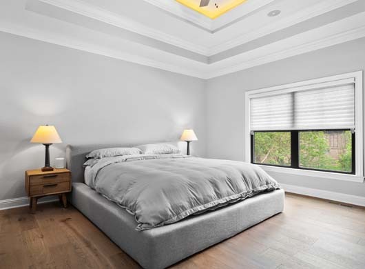 Silhouette® Sheer Shades Halfway in Bedroom