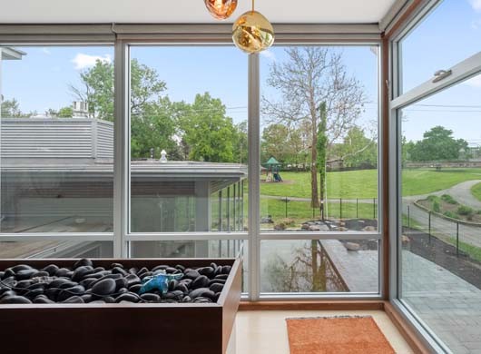Designer Solar Screen Shades Up in Sunroom