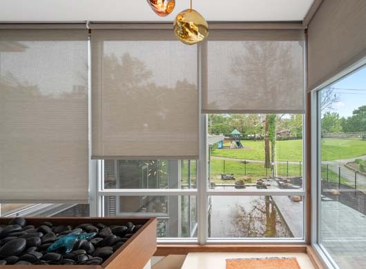 Designer Solar Screen Shades Halfway in Sunroom