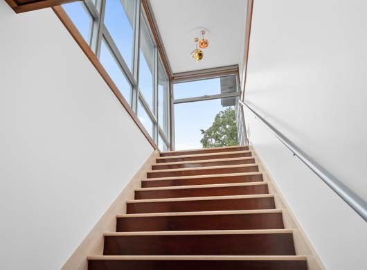 Designer Solar Screen Shades Up in Stairway