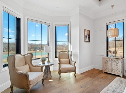 Designer Roller Shades in Sitting Area Up