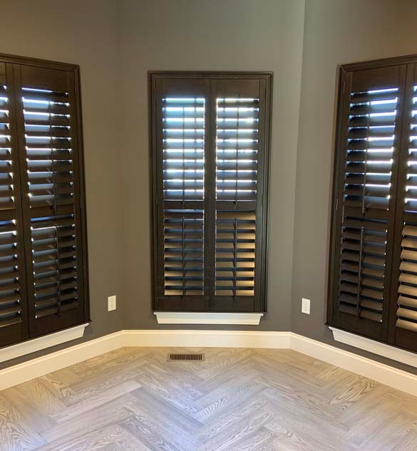 Heritance® Hardwood Shutters on Bay Window