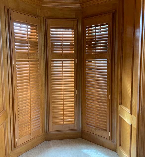 Heritance® Hardwood Shutters on Bay Window