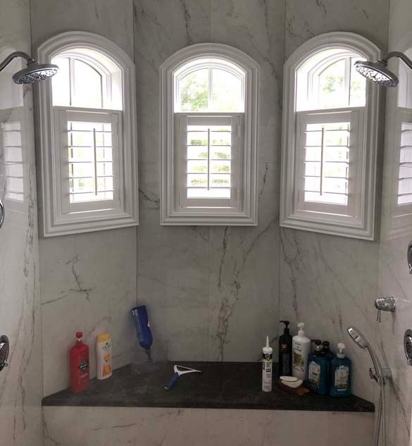 Palm Beach™ Polysatin™ Shutters in Shower