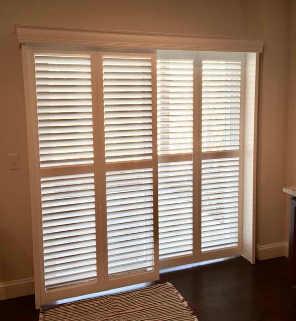 Palm Beach™ Polysatin™ Bi-Fold-Shutters on Sliding Door